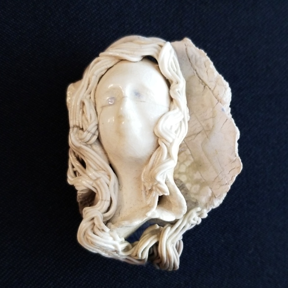 Woman face "cameo" modern style pin